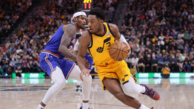 Utah Jazz guard Trent Forrest (3) dribbles past New York Knicks forward Cam Reddish (21) in the third quarter at Vivint Arena.